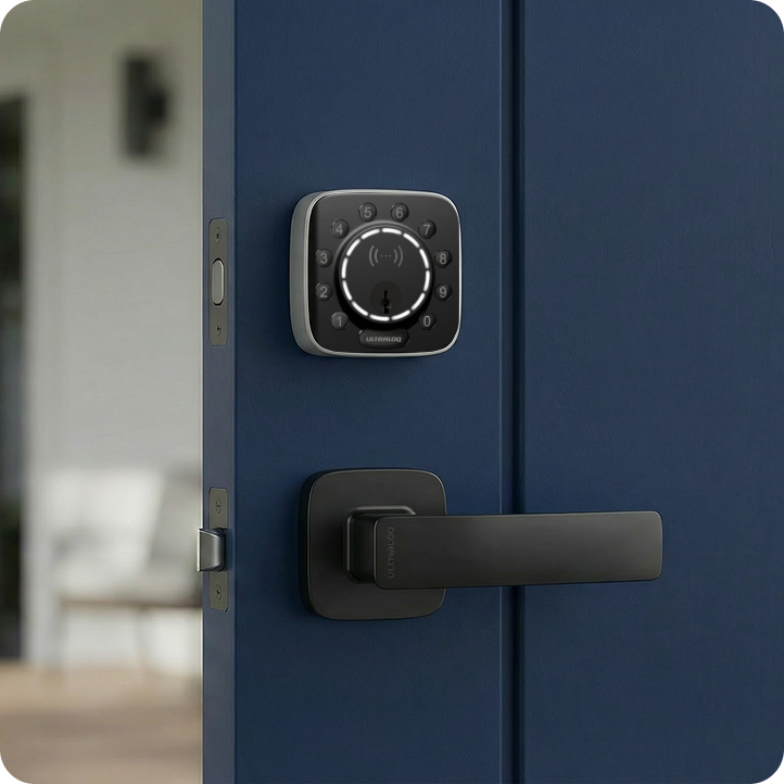 ULTRALOQ Bolt Mission smart deadbolt with black door handle installed on a blue front door