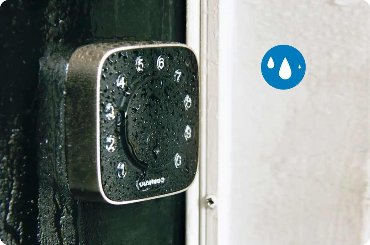 
Weather-resistant smart lock installed on an exterior door in rainy conditions
