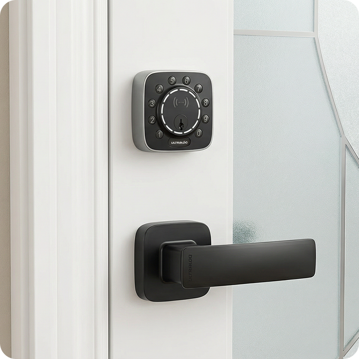 ULTRALOQ Bolt Mission smart deadbolt with black door handle installed on a modern white door