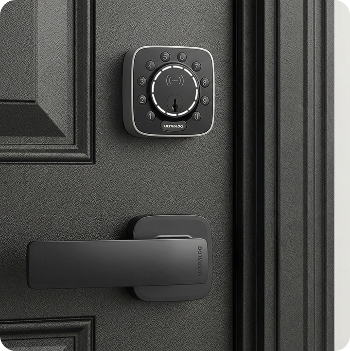 ULTRALOQ smart deadbolt with matching black door handle installed on a black front door