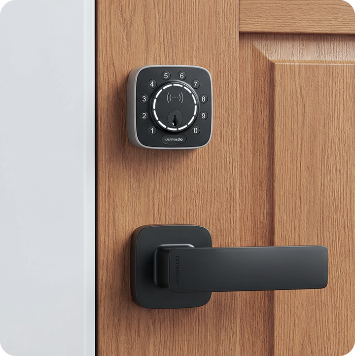 ULTRALOQ smart deadbolt with black door handle installed on a natural wood front door