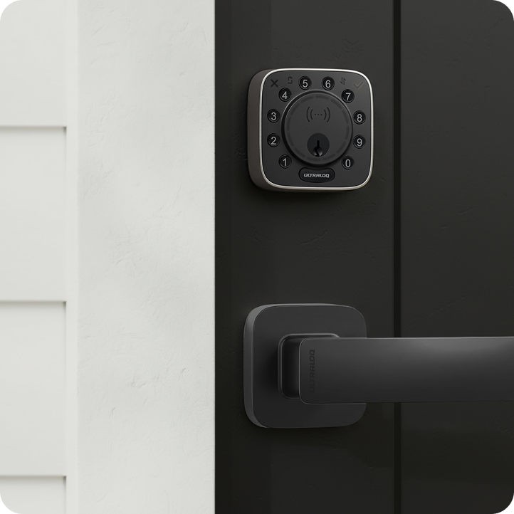 ULTRALOQ Bolt Mission smart deadbolt with matching black door handle installed on a modern entry door